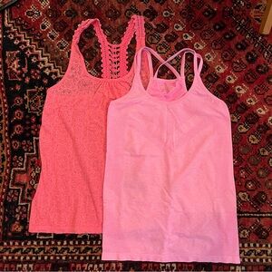 🛍️ Two hot pink racerback tank tops